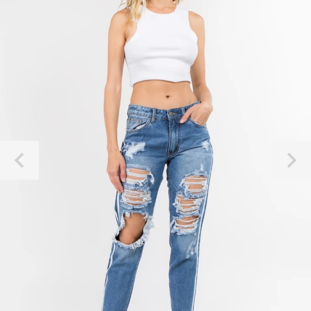Side tape destroyed jeans